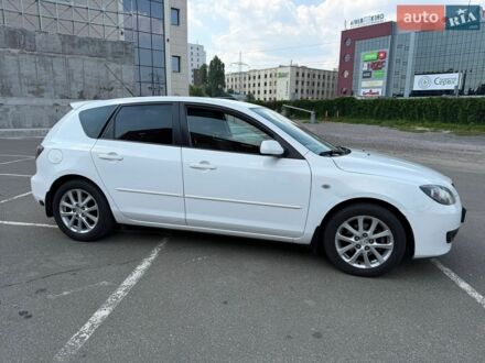 Белый Мазда 3, объемом двигателя 2 л и пробегом 161 тыс. км за 6700 $, фото 1 на Automoto.ua