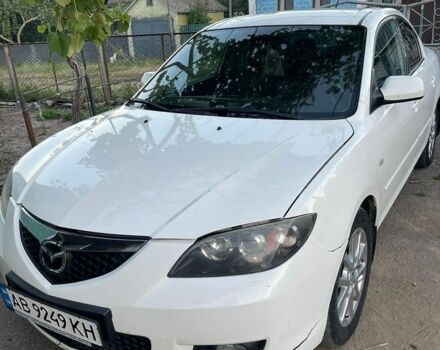 Белый Мазда 3, объемом двигателя 2 л и пробегом 225 тыс. км за 4000 $, фото 1 на Automoto.ua