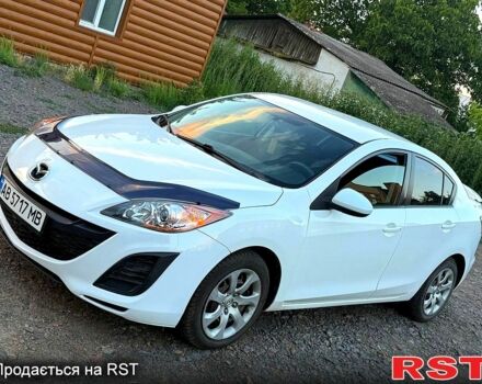 Белый Мазда 3, объемом двигателя 2 л и пробегом 140 тыс. км за 7800 $, фото 1 на Automoto.ua
