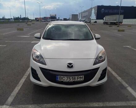 Белый Мазда 3, объемом двигателя 2 л и пробегом 230 тыс. км за 6700 $, фото 1 на Automoto.ua