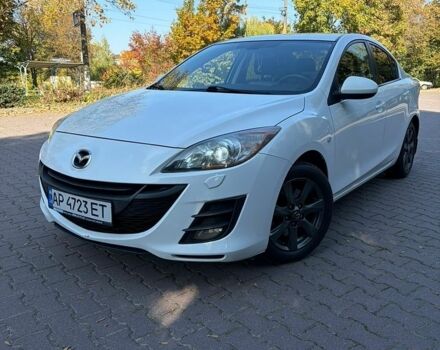 Белый Мазда 3, объемом двигателя 2 л и пробегом 173 тыс. км за 7000 $, фото 1 на Automoto.ua