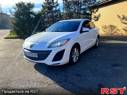 Білий Мазда 3, об'ємом двигуна 2 л та пробігом 140 тис. км за 6550 $, фото 1 на Automoto.ua