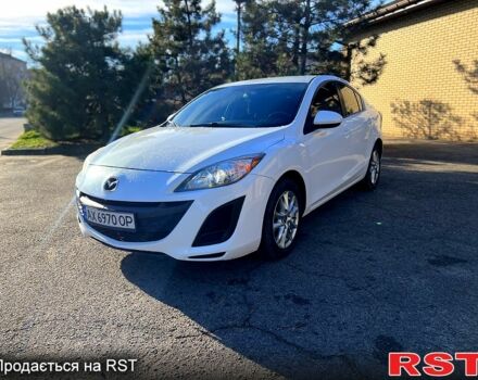 Белый Мазда 3, объемом двигателя 2 л и пробегом 140 тыс. км за 6550 $, фото 1 на Automoto.ua