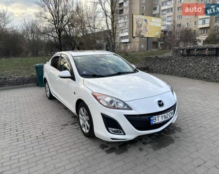 Белый Мазда 3, объемом двигателя 2 л и пробегом 199 тыс. км за 6850 $, фото 1 на Automoto.ua