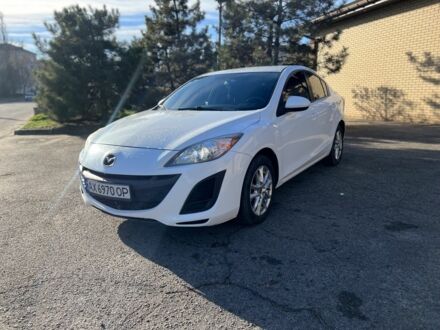 Білий Мазда 3, об'ємом двигуна 2 л та пробігом 140 тис. км за 6550 $, фото 1 на Automoto.ua