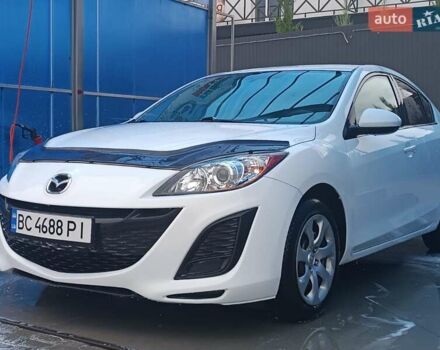 Білий Мазда 3, об'ємом двигуна 2 л та пробігом 137 тис. км за 6499 $, фото 1 на Automoto.ua