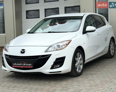 Белый Мазда 3, объемом двигателя 2 л и пробегом 160 тыс. км за 9799 $, фото 1 на Automoto.ua
