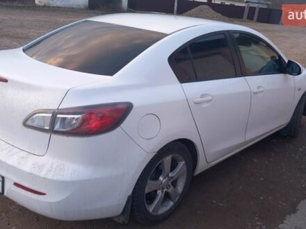 Белый Мазда 3, объемом двигателя 2 л и пробегом 100 тыс. км за 7000 $, фото 1 на Automoto.ua