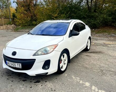 Белый Мазда 3, объемом двигателя 2 л и пробегом 200 тыс. км за 7500 $, фото 1 на Automoto.ua