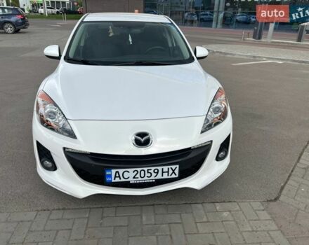 Белый Мазда 3, объемом двигателя 2 л и пробегом 132 тыс. км за 10650 $, фото 1 на Automoto.ua