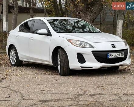 Белый Мазда 3, объемом двигателя 2 л и пробегом 200 тыс. км за 7900 $, фото 1 на Automoto.ua