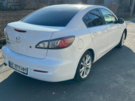 Белый Мазда 3, объемом двигателя 2 л и пробегом 230 тыс. км за 7500 $, фото 1 на Automoto.ua
