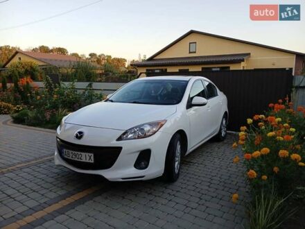 Белый Мазда 3, объемом двигателя 2 л и пробегом 252 тыс. км за 8300 $, фото 1 на Automoto.ua