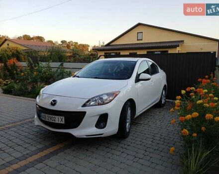 Белый Мазда 3, объемом двигателя 2 л и пробегом 252 тыс. км за 8300 $, фото 1 на Automoto.ua