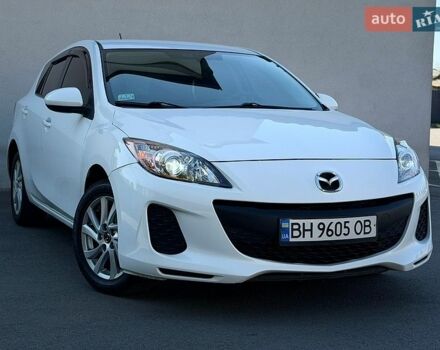 Белый Мазда 3, объемом двигателя 2 л и пробегом 208 тыс. км за 6990 $, фото 1 на Automoto.ua