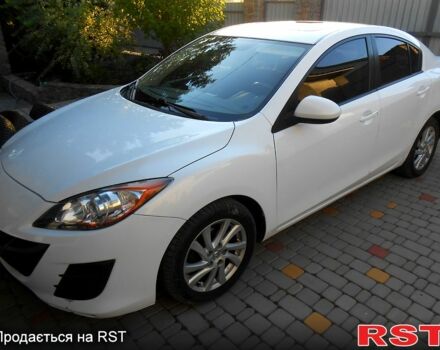 Белый Мазда 3, объемом двигателя 2 л и пробегом 213 тыс. км за 6000 $, фото 1 на Automoto.ua