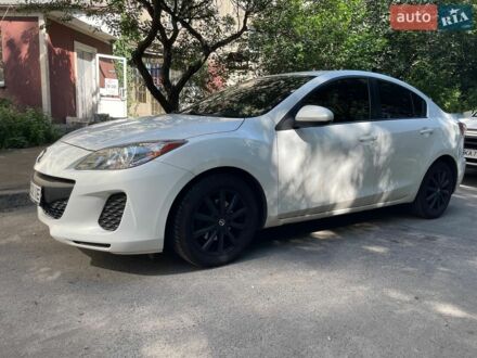 Белый Мазда 3, объемом двигателя 2 л и пробегом 190 тыс. км за 6450 $, фото 1 на Automoto.ua