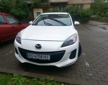 Белый Мазда 3, объемом двигателя 2 л и пробегом 240 тыс. км за 7999 $, фото 1 на Automoto.ua