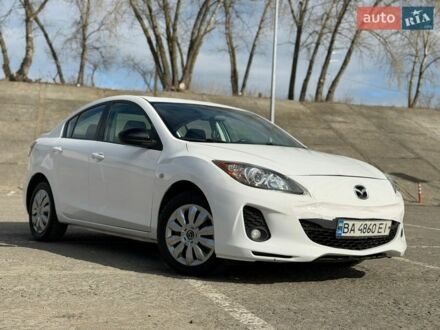 Белый Мазда 3, объемом двигателя 2 л и пробегом 194 тыс. км за 6950 $, фото 1 на Automoto.ua
