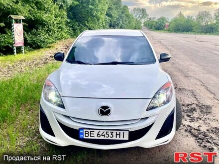 Белый Мазда 3, объемом двигателя 2 л и пробегом 244 тыс. км за 7300 $, фото 1 на Automoto.ua