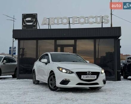 Белый Мазда 3, объемом двигателя 2 л и пробегом 195 тыс. км за 10490 $, фото 1 на Automoto.ua
