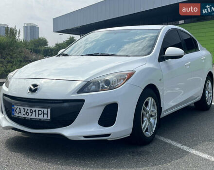 Белый Мазда 3, объемом двигателя 2 л и пробегом 170 тыс. км за 8900 $, фото 1 на Automoto.ua