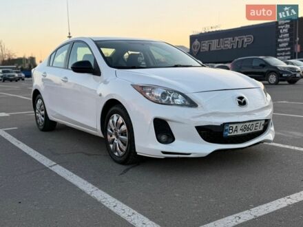 Белый Мазда 3, объемом двигателя 2 л и пробегом 194 тыс. км за 7200 $, фото 1 на Automoto.ua