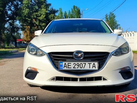 Белый Мазда 3, объемом двигателя 2 л и пробегом 141 тыс. км за 9600 $, фото 1 на Automoto.ua
