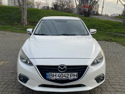 Белый Мазда 3, объемом двигателя 2 л и пробегом 150 тыс. км за 9900 $, фото 1 на Automoto.ua