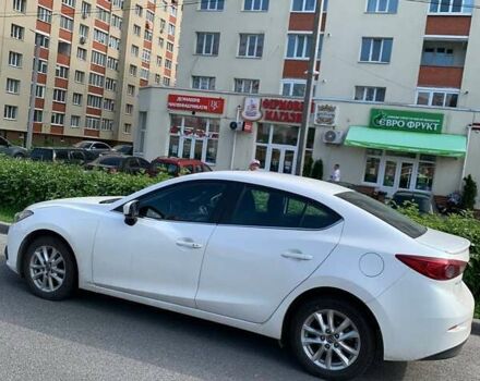 Белый Мазда 3, объемом двигателя 2 л и пробегом 156 тыс. км за 11800 $, фото 1 на Automoto.ua