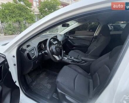 Белый Мазда 3, объемом двигателя 2 л и пробегом 114 тыс. км за 10001 $, фото 1 на Automoto.ua