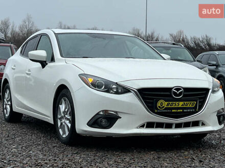 Белый Мазда 3, объемом двигателя 2 л и пробегом 119 тыс. км за 12650 $, фото 1 на Automoto.ua