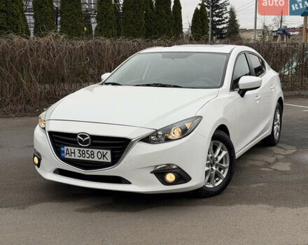Белый Мазда 3, объемом двигателя 2 л и пробегом 170 тыс. км за 10400 $, фото 1 на Automoto.ua