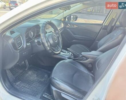 Белый Мазда 3, объемом двигателя 2 л и пробегом 94 тыс. км за 13000 $, фото 1 на Automoto.ua