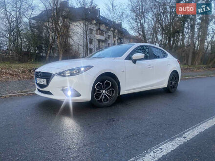 Белый Мазда 3, объемом двигателя 2 л и пробегом 120 тыс. км за 12500 $, фото 1 на Automoto.ua