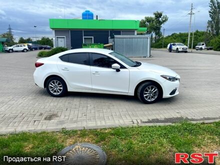 Белый Мазда 3, объемом двигателя 2 л и пробегом 196 тыс. км за 11300 $, фото 1 на Automoto.ua