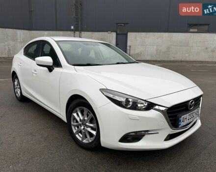 Білий Мазда 3, об'ємом двигуна 1.5 л та пробігом 58 тис. км за 15299 $, фото 1 на Automoto.ua