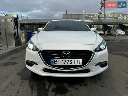 Белый Мазда 3, объемом двигателя 2 л и пробегом 197 тыс. км за 10500 $, фото 1 на Automoto.ua