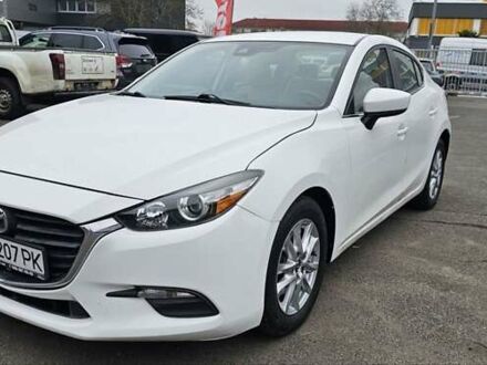 Белый Мазда 3, объемом двигателя 2 л и пробегом 130 тыс. км за 9900 $, фото 1 на Automoto.ua