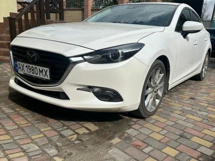 Белый Мазда 3, объемом двигателя 2.49 л и пробегом 125 тыс. км за 13900 $, фото 1 на Automoto.ua