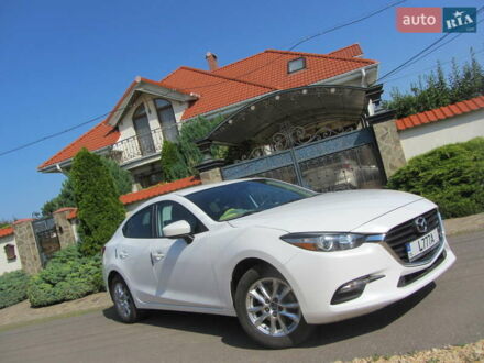 Белый Мазда 3, объемом двигателя 2 л и пробегом 156 тыс. км за 11222 $, фото 1 на Automoto.ua