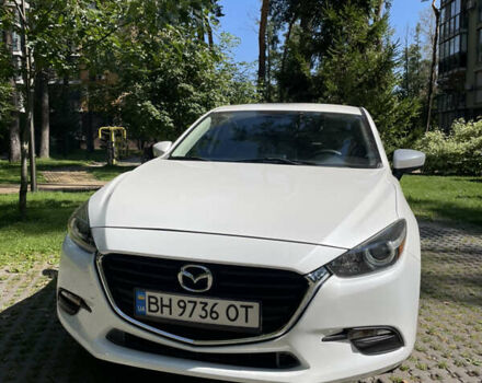 Белый Мазда 3, объемом двигателя 2 л и пробегом 115 тыс. км за 12699 $, фото 1 на Automoto.ua