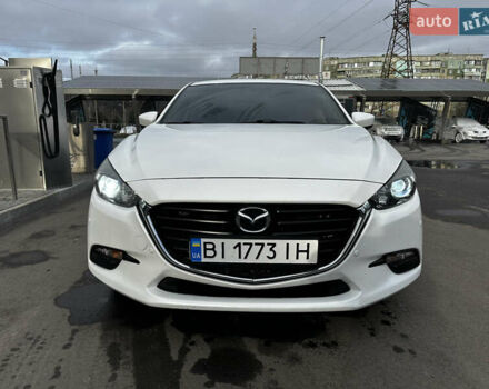 Белый Мазда 3, объемом двигателя 2 л и пробегом 196 тыс. км за 11000 $, фото 1 на Automoto.ua