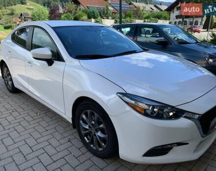 Белый Мазда 3, объемом двигателя 2 л и пробегом 156 тыс. км за 10035 $, фото 1 на Automoto.ua