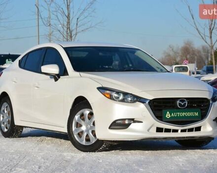 Белый Мазда 3, объемом двигателя 2 л и пробегом 90 тыс. км за 12999 $, фото 1 на Automoto.ua