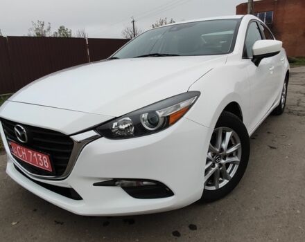 Белый Мазда 3, объемом двигателя 2 л и пробегом 202 тыс. км за 11800 $, фото 1 на Automoto.ua