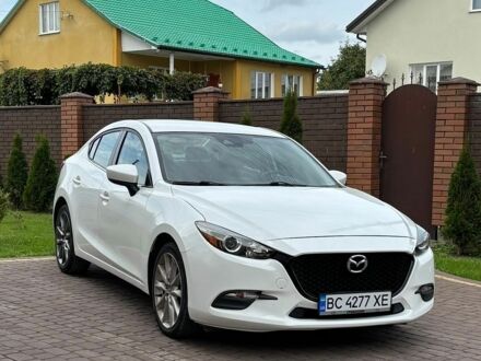 Белый Мазда 3, объемом двигателя 2.49 л и пробегом 127 тыс. км за 13799 $, фото 1 на Automoto.ua