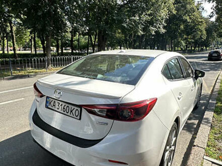 Белый Мазда 3, объемом двигателя 2 л и пробегом 99 тыс. км за 13950 $, фото 1 на Automoto.ua