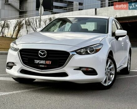 Белый Мазда 3, объемом двигателя 2 л и пробегом 95 тыс. км за 11800 $, фото 1 на Automoto.ua