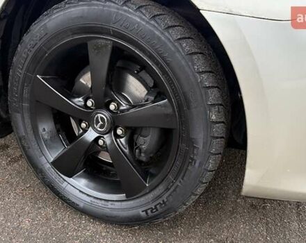 Бежевый Мазда 3, объемом двигателя 1.6 л и пробегом 262 тыс. км за 4250 $, фото 28 на Automoto.ua